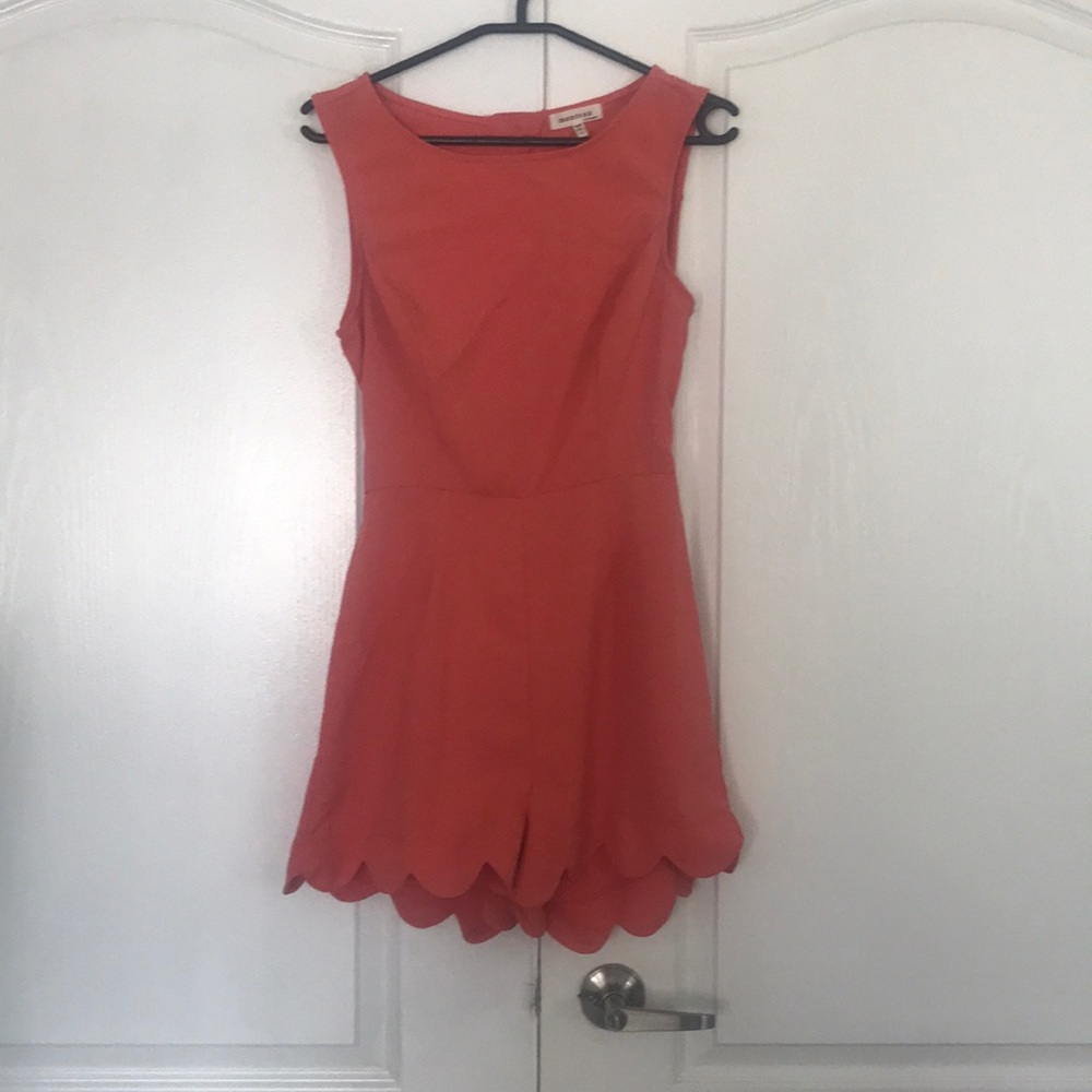 Peach romper with mid back cut out